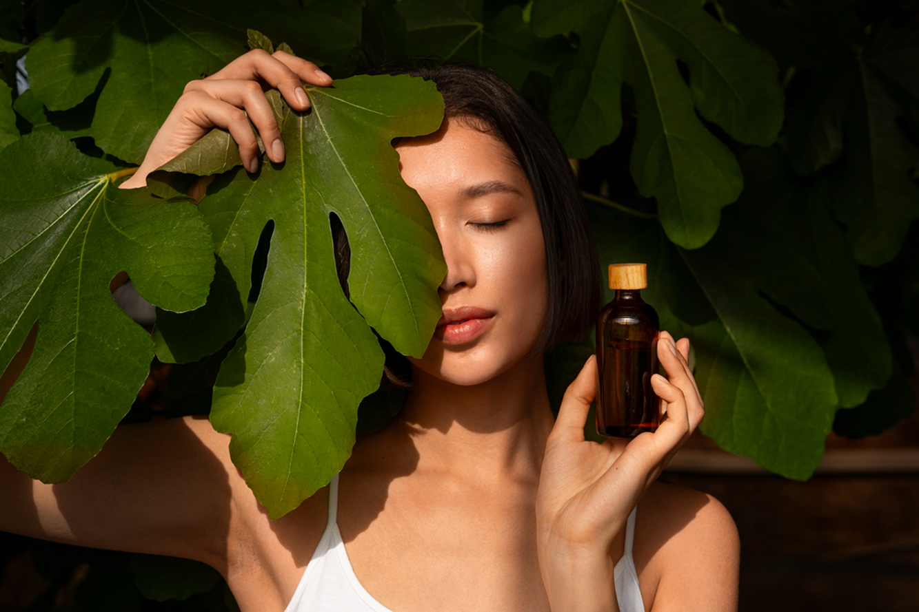 Image of girl hiding behind the leaves